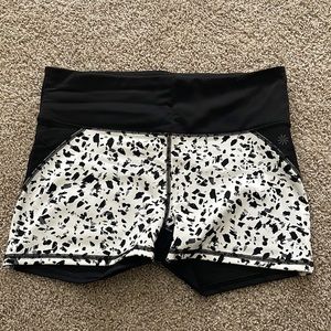 ATHLETA white animal print stealth short, size large